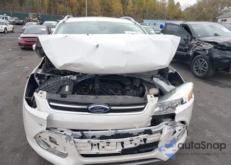 2014 Ford Escape Titanium z USA, uszkodzony, nr VIN 1FMCU9JX8EUC41091